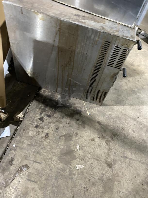 Bakers Pride GP-51 commercial stainless steel deck oven, natural gas, visible wear and stains, serial number 35745.