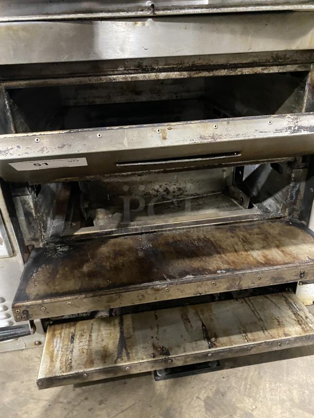 Bakers Pride GP-51 stainless steel countertop deck oven, natural gas, used condition, visible wear and residue. Model number on panel.