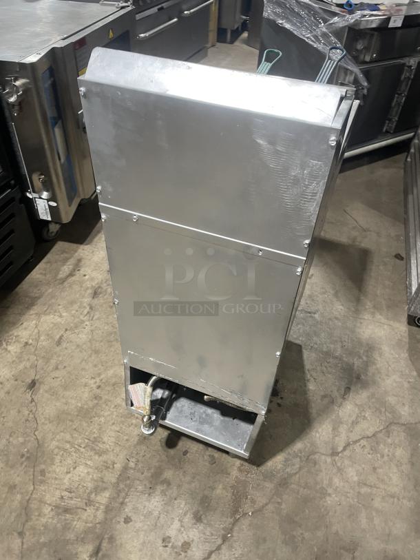 Imperial stainless steel natural gas fryer with backsplash, basket hanger, and legs. Appears in good condition.