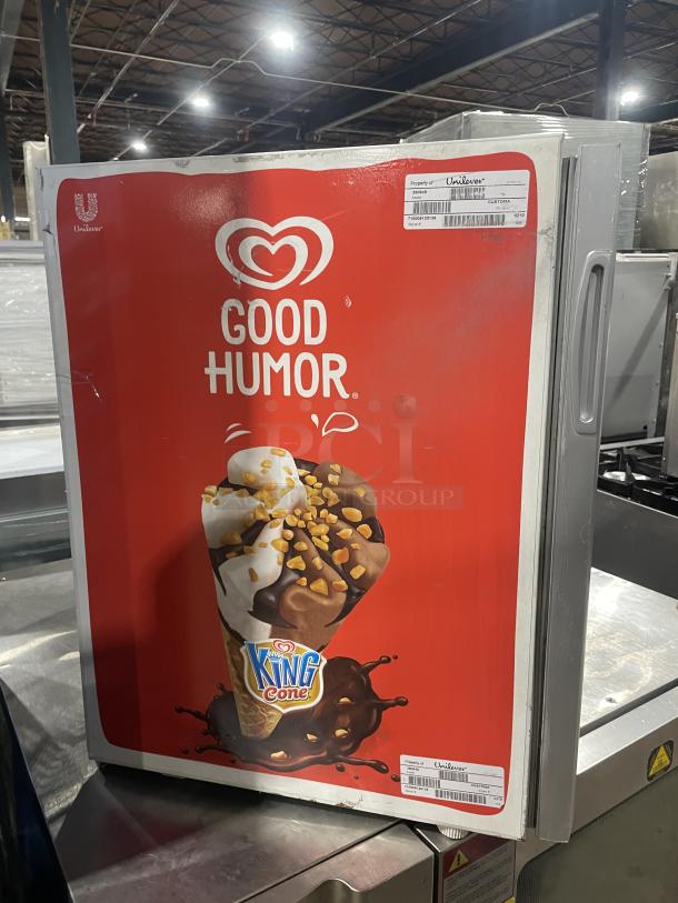 Good Humor countertop merchandiser freezer, model 8210, white powder-coated, poly-coated wire rack, SN: 710009120136.