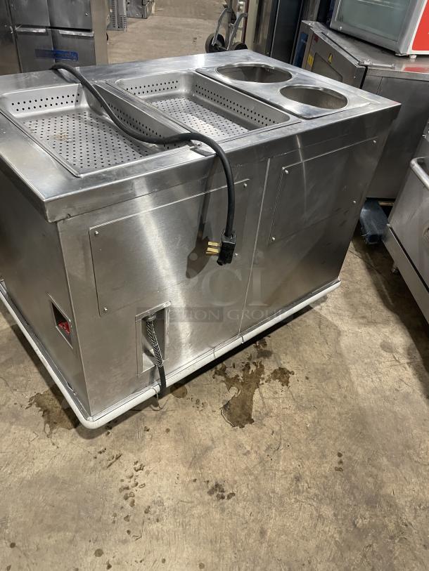 Carter Hoffmann CC345 stainless steel heating cabinet on casters, SN: 367840-052003, 208V. Features dual perforated trays.