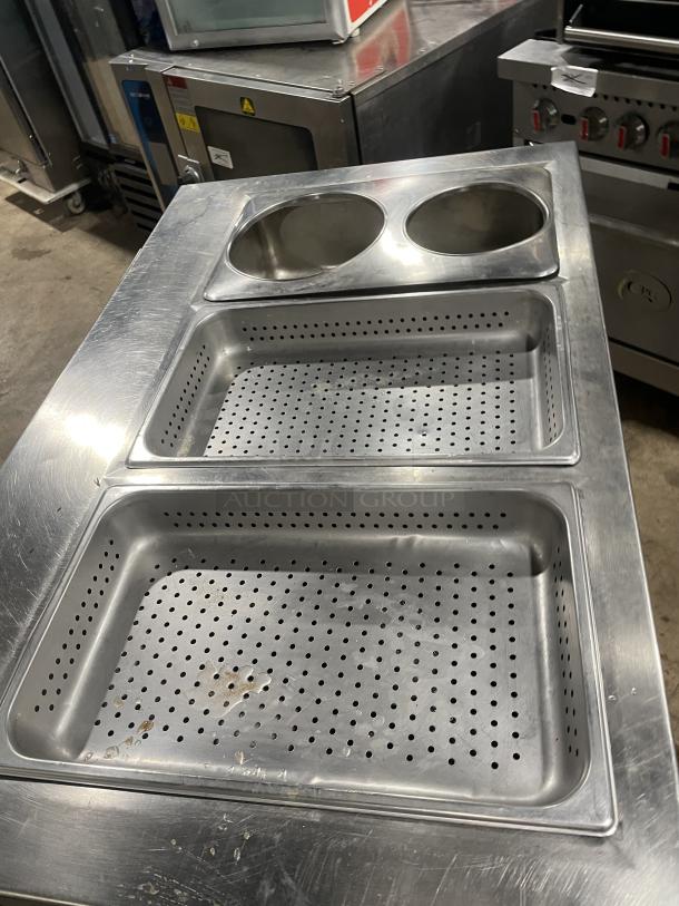 Carter Hoffmann CC345 stainless steel commercial heating cabinet on casters, features dual interior trays. Model SN: 367840-052003.