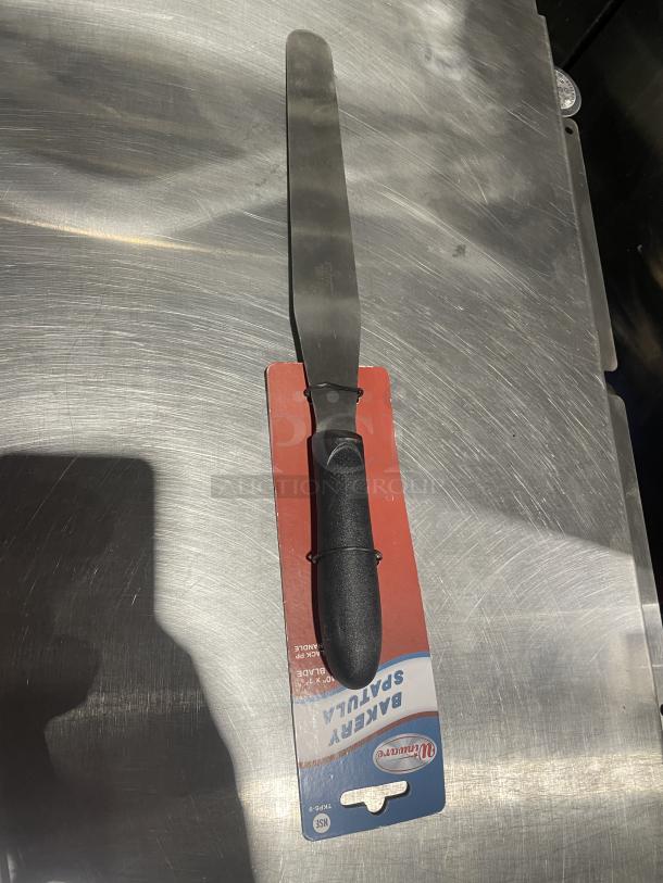 Winco Winware TKPS-9 bakery spatula, stainless steel blade, black grip handle, tag shows branding and model details. Brand new.