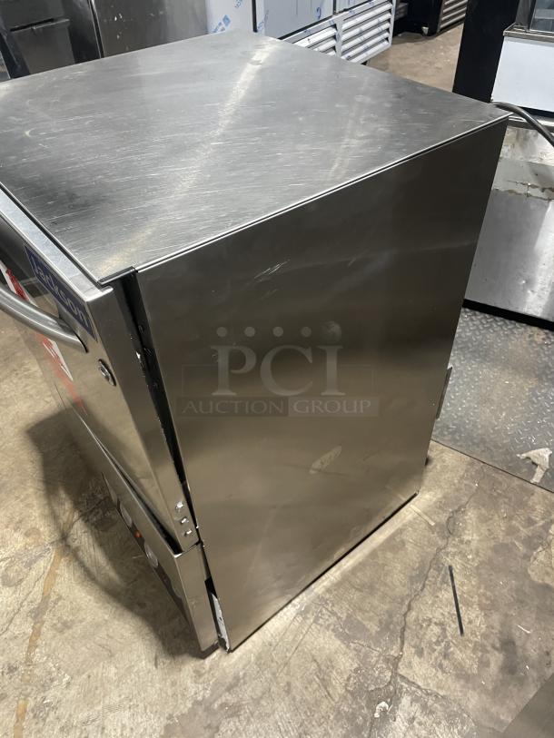 Jackson Avengerht stainless steel under counter high temp dishwasher with dish rack, SN: 13F282915, 208/230V, 1 Phase.