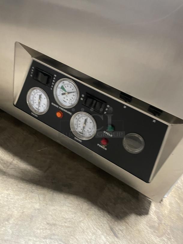 Jackson Avengerht stainless steel high-temp under-counter dishwasher with gauges, cycle, and power indicators. Model: Avengerht SN: 13F282915.