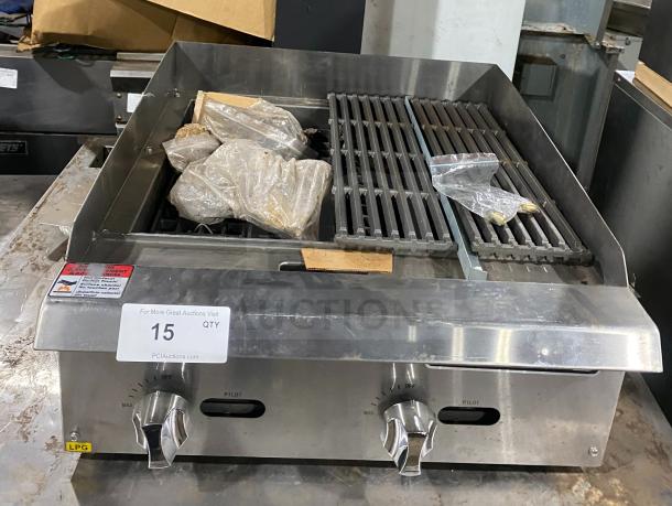 Cayvo Stainless Steel Gas Char-Rock Broiler, Model CVCB-24LP. Features dual control knobs, grill grates, new condition.