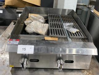 Cayvo Stainless Steel Gas Char-Rock Broiler, Model CVCB-24LP. Features dual control knobs, grill grates, new condition.