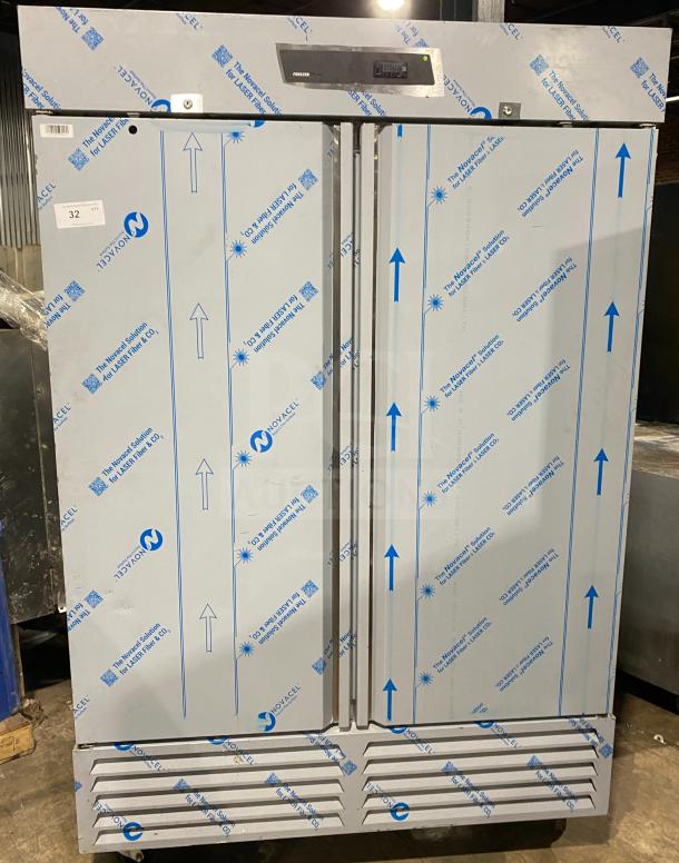 Kutano KUTF 2 SS commercial stainless steel reach-in freezer, 2 doors, 115V, 1 phase, new with protective film, SN: 8103206950.