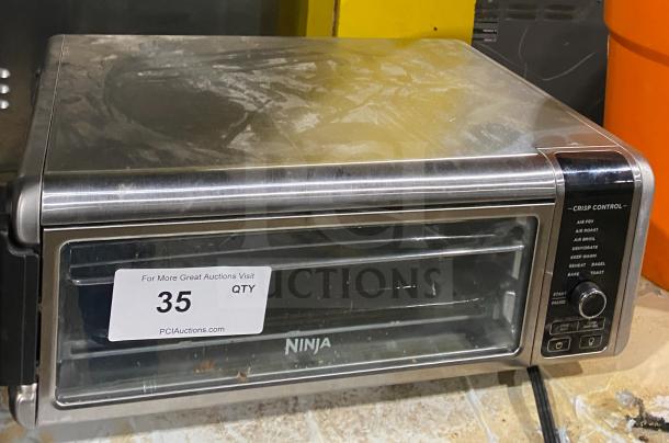 Ninja FT102CO countertop digital air fry oven with view-through door, model SN: U17RQ603F1A6, used condition, 120V.