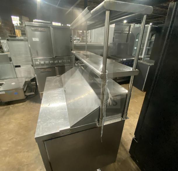 Hoshizaki CRMR48-12 commercial stainless steel refrigerator with top rail, in good condition. Model: CRMR48-12, SN: B50037E.
