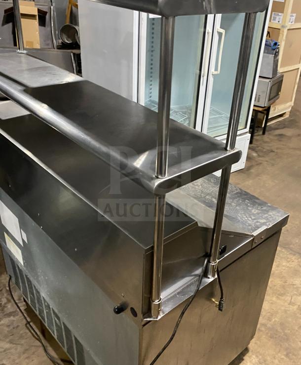 Hoshizaki commercial stainless steel refrigerator with top rail, Model CRMR48-12, SN: B50037E, shown in used condition.
