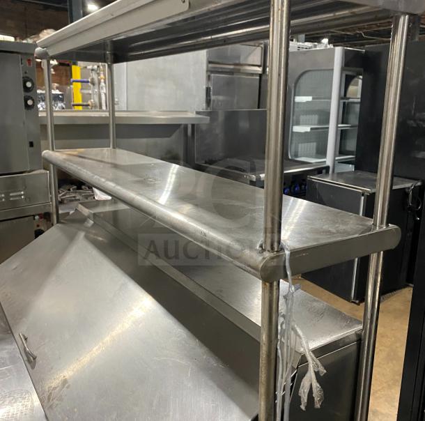Hoshizaki CRMR48-12 commercial stainless steel refrigerator with top rail, good condition. Serial number B50037E.