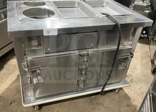 Carter Hoffmann heating/proofer cabinet, model CC345, stainless steel, on casters, serial 367840-052003, 208V, with compartments.