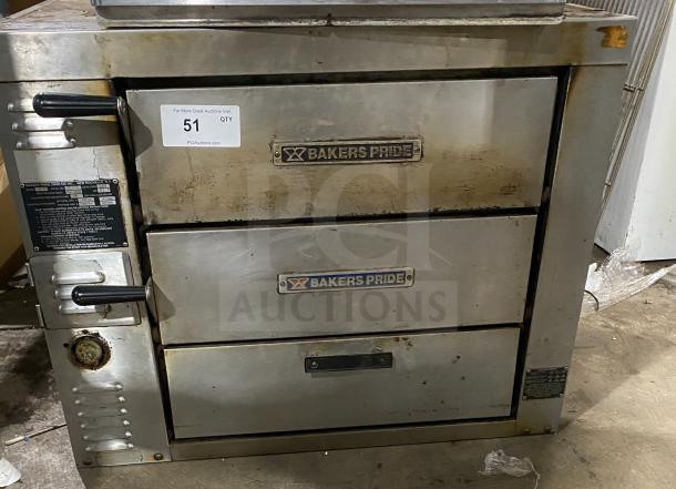 Bakers Pride GP-51 stainless steel gas deck oven, dual compartments, used condition, serial number 35745 visible, industrial setting.