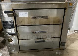 Bakers Pride GP-51 stainless steel gas deck oven, dual compartments, used condition, serial number 35745 visible, industrial setting.