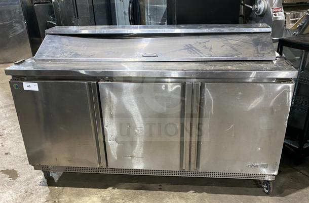 Asber 3-door stainless steel prep table refrigerator, model APTS7218, on casters, with poly coated rack, good condition.