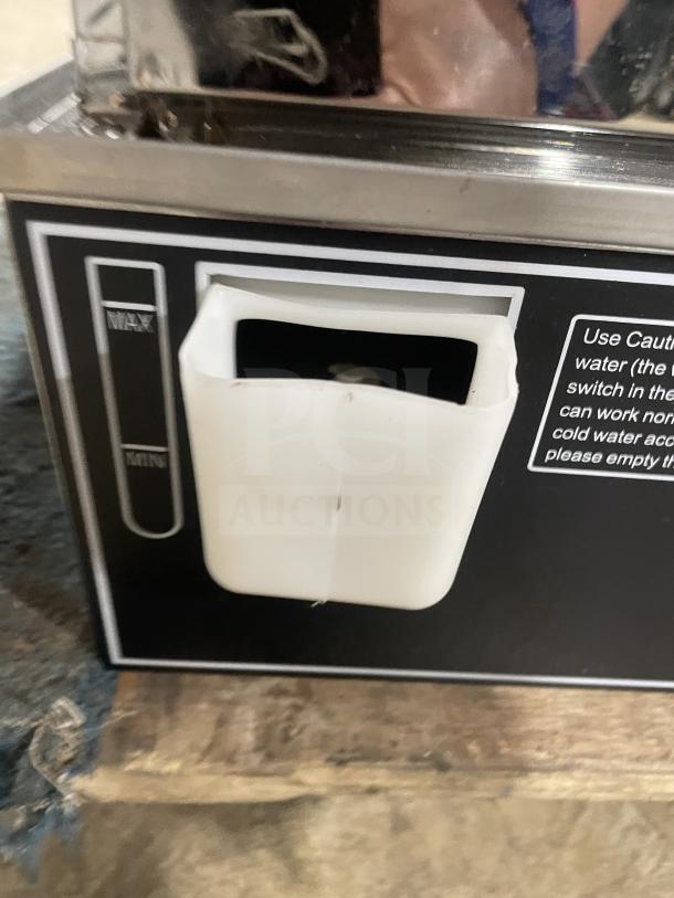 Commercial stainless steel electric bun steamer with 5 layers, glass door, and visible water level gauge.