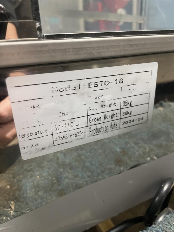 Commercial stainless steel electric bun steamer, model ESTC-18, 5 layers, with glass door. Weight: 36kg, temp: 30-110°C.