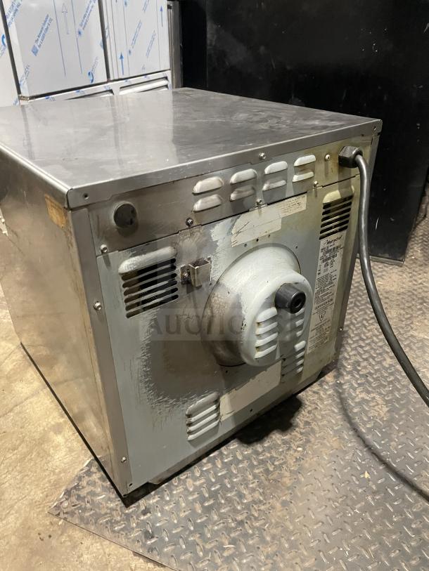 MerryChef Eikon E4 commercial rapid cook oven, stainless steel, electric, worn condition, visible power cord and vents.