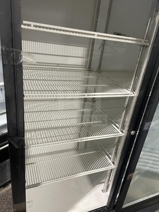 Beverage-Air MT45 black double glass swing door refrigerator with poly-coated wired racks, 115V, 1 phase, model SN 31077X98968.
