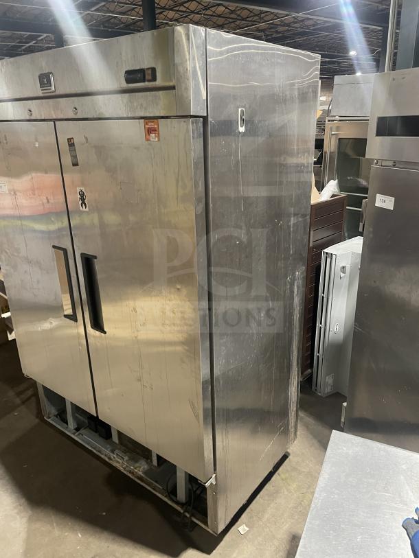 Kelvinator KCBM48RSE-HC stainless steel 2-door reach-in freezer, commercial use, on casters, with poly coated wired rack.