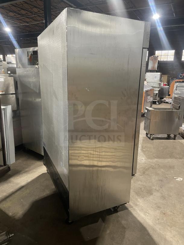 Kelvinator KCBM48RSE-HC stainless steel 2-door reach-in freezer on casters, with poly-coated wire rack, commercial-grade.