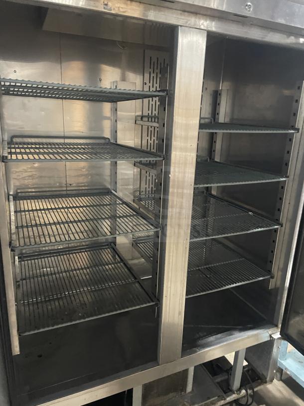 Kelvinator KCBM48RSE-HC stainless steel 2-door reach-in freezer with poly-coated wire racks, on casters, 115V, 60Hz.