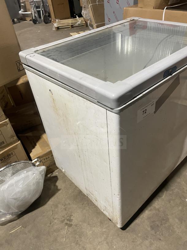 Nordon SDS-250 ice cream dipping cabinet, commercial-grade, glass top, visible wear, model and voltage label present.