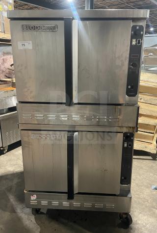 Blodgett stainless steel gas double convection oven, thermostatic controls, wired rack, on casters; visible wear.