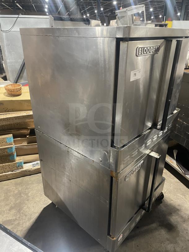 Blodgett commercial stainless steel double stacked convection oven, thermostatic controls, wired racks, casters, used condition.