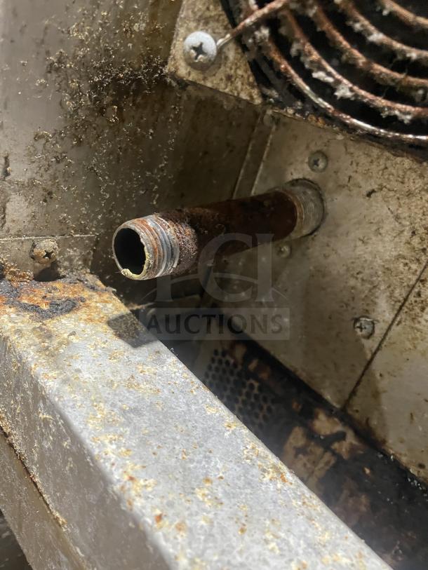 Blodgett commercial stainless steel gas convection oven detail, showing a rusty pipe area. Needs cleaning or repair.