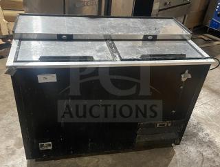 Kelvinator commercial bottle cooler, model AUB50RZ, stainless steel, horizontal, on casters, used condition.