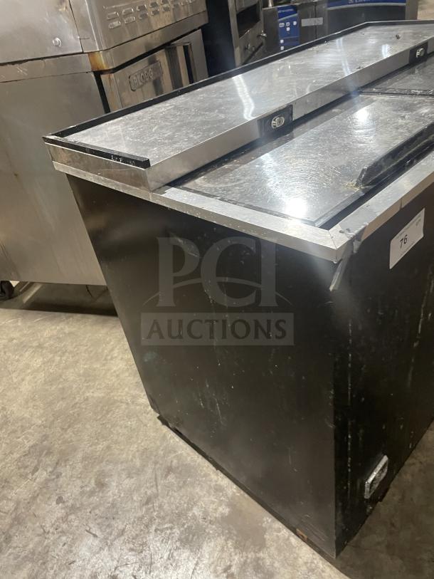 Kelvinator stainless steel bottle cooler, model AUB50RZ. Features top lids, on casters. Serial: H20039388, 115V, 60HZ.