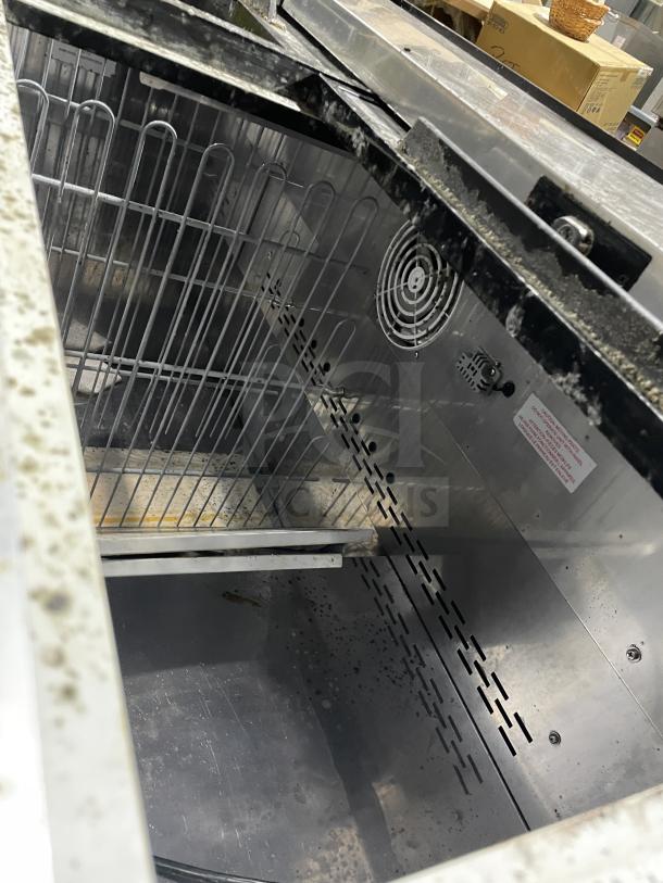 Kelvinator AUB50RZ stainless steel bottle cooler, deep well design, interior view with grid racks, on casters, 115V.