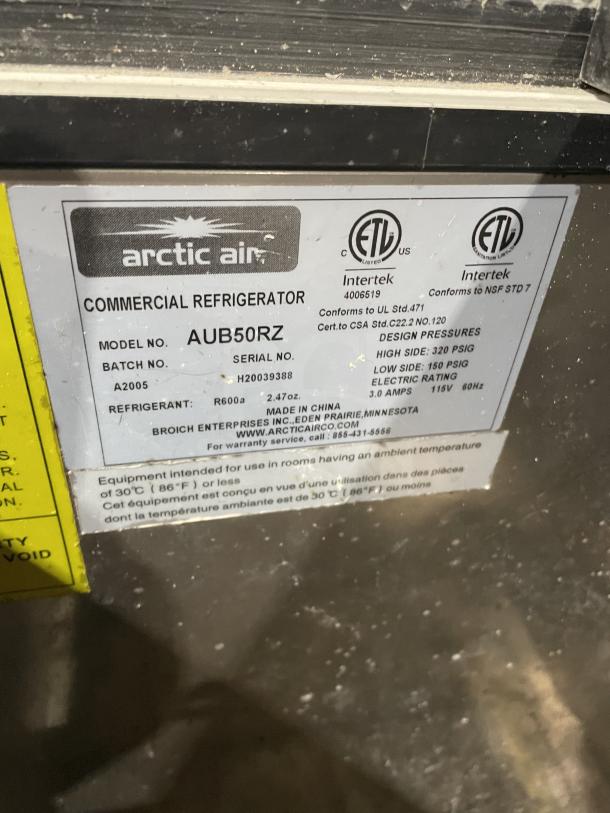 Arctic Air commercial bottle cooler, Model AUB50RZ, stainless steel, serial H20039388, on casters, ETL certified.