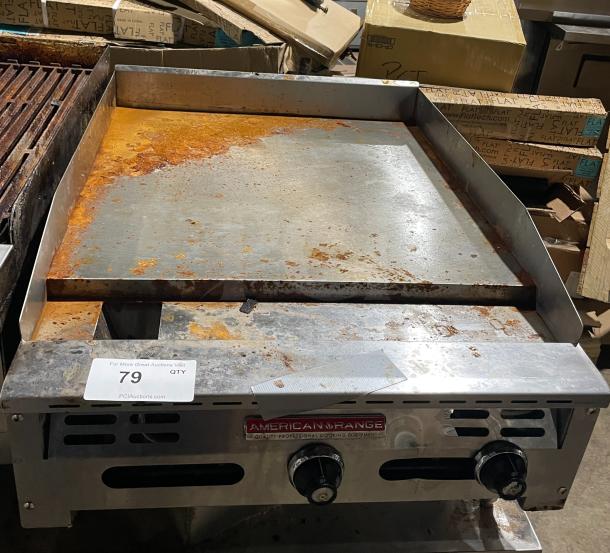 American Range stainless steel natural gas countertop griddle, AETG-124-24XT, with back and side splash, on casters. Signs of wear.