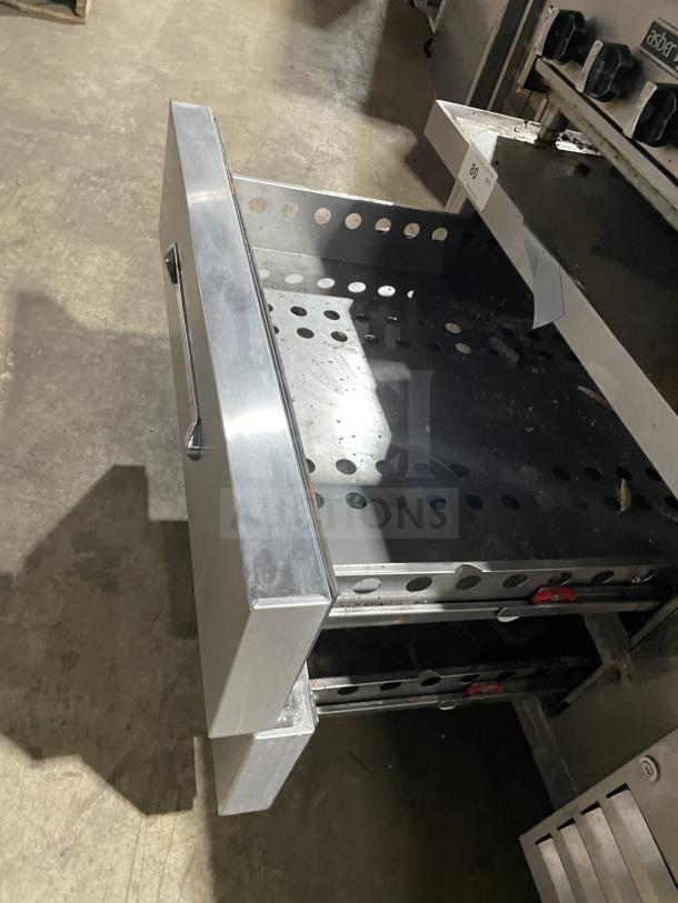 Kelvinator commercial stainless steel chef base with 2 drawers, Model KCHCB48R, on casters, used condition.