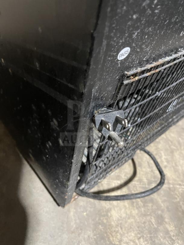 Eurodib USF-1688 wine cooler, 110/120V, single door, visible wear, "PASS" label indicating inspection approval.