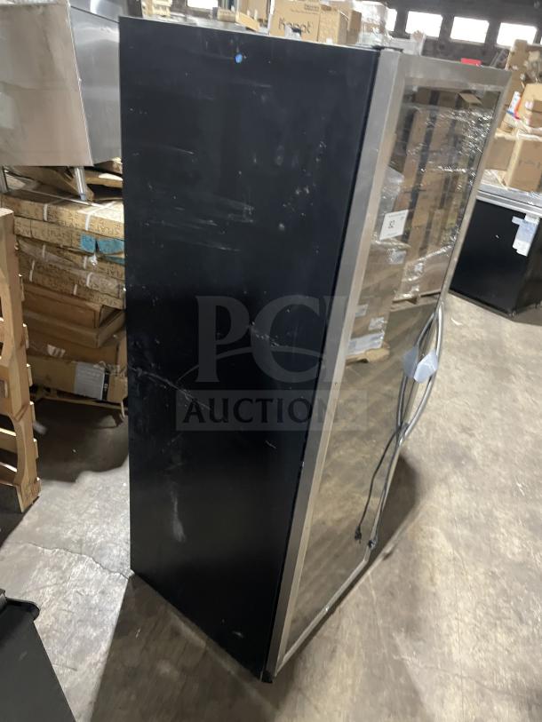 Eurodip USF-168S single door wine cooler. Black exterior, visible wear. 110/120V, 60Hz. Ideal for commercial use.