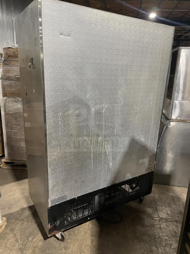 Kelvinator commercial stainless steel 2-door reach-in refrigerator, poly-coated wire racks, on casters, 115V, 60Hz.