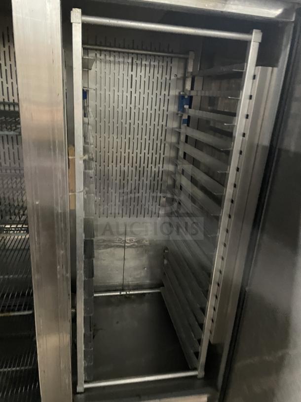 Kelvinator stainless steel 2-door refrigerator with poly-coated wire racks, 115V, 60HZ, on casters, commercial use.