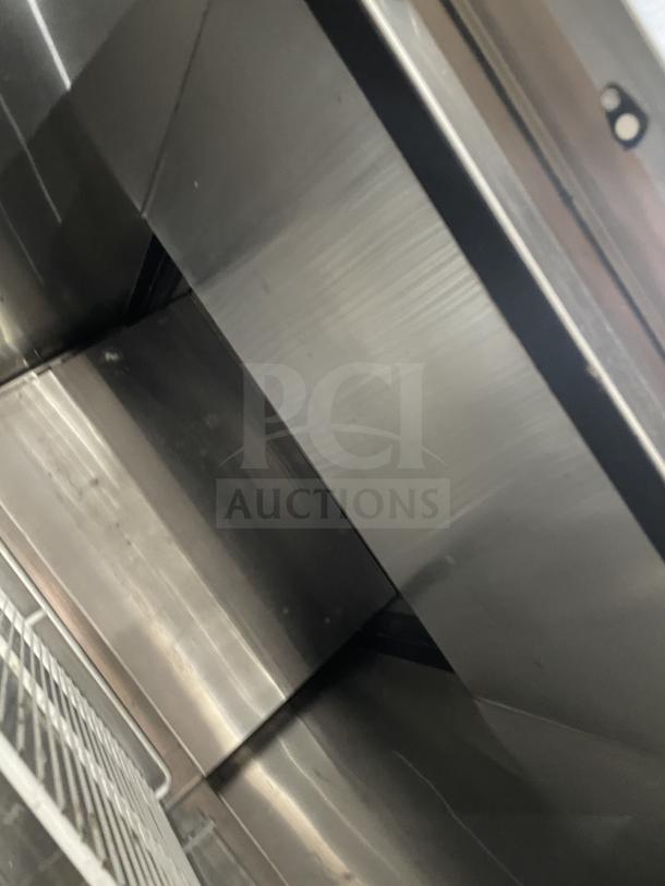 Beverage Air stainless steel single door refrigerator, Model TMR1HC-1S, with poly coated rack, in good condition, on casters.