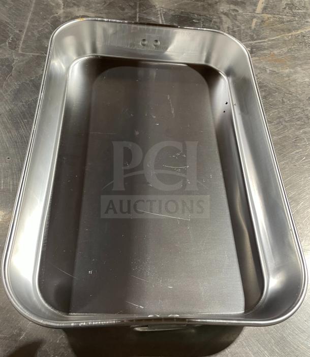 Commercial stainless steel bake pan, rectangular, smooth finish, minor scratches, durable and versatile for baking.