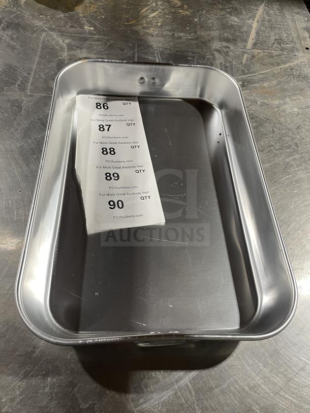Winco commercial stainless steel bake pan, durable construction, excellent condition. Includes auction tags with lot numbers.