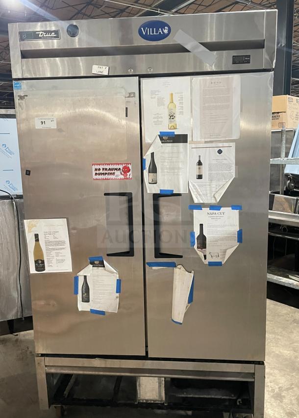 True T-43-HC stainless steel 2-door reach-in refrigerator, on casters, 115V 1 Phase, with poly-coated wire racks.