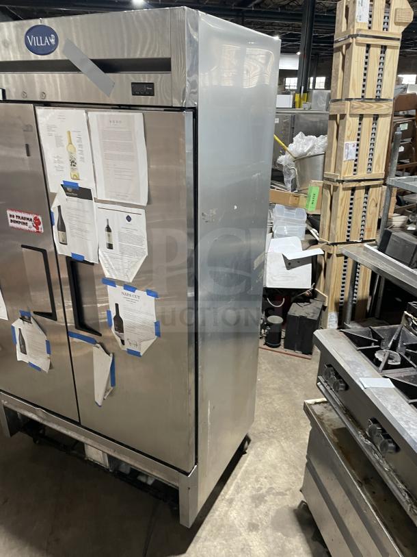 True T-43-HC stainless steel 2-door reach-in refrigerator, commercial grade, with poly-coated wired rack, on casters.