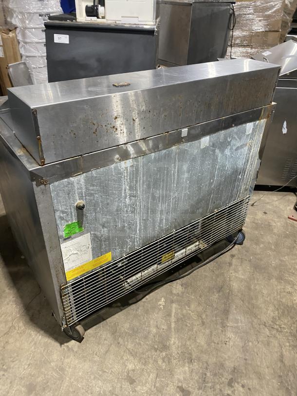 Asber stainless steel 2-door refrigerated bain marie prep table on casters. Visible wear and markings.