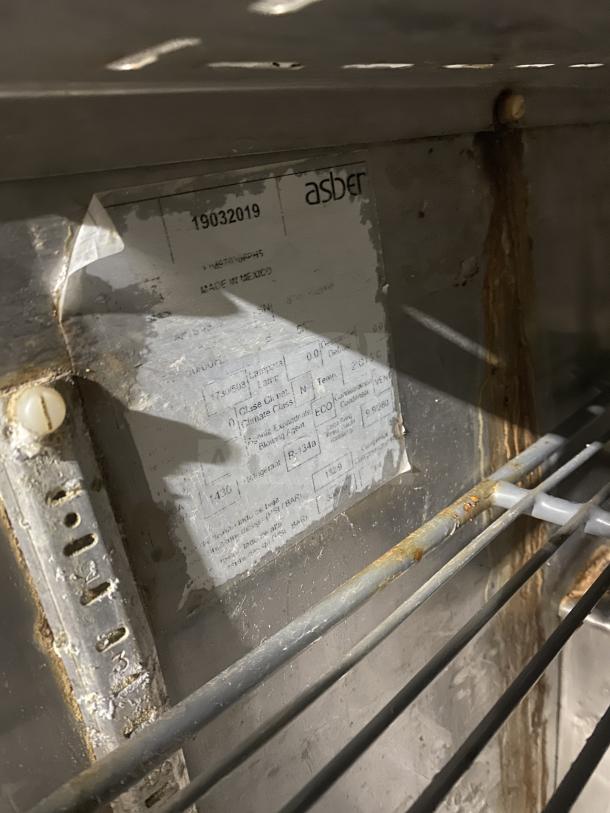 Asber stainless steel 2-door refrigerated bain marie prep table, on casters, with visible manufacturer's label. Condition: used.