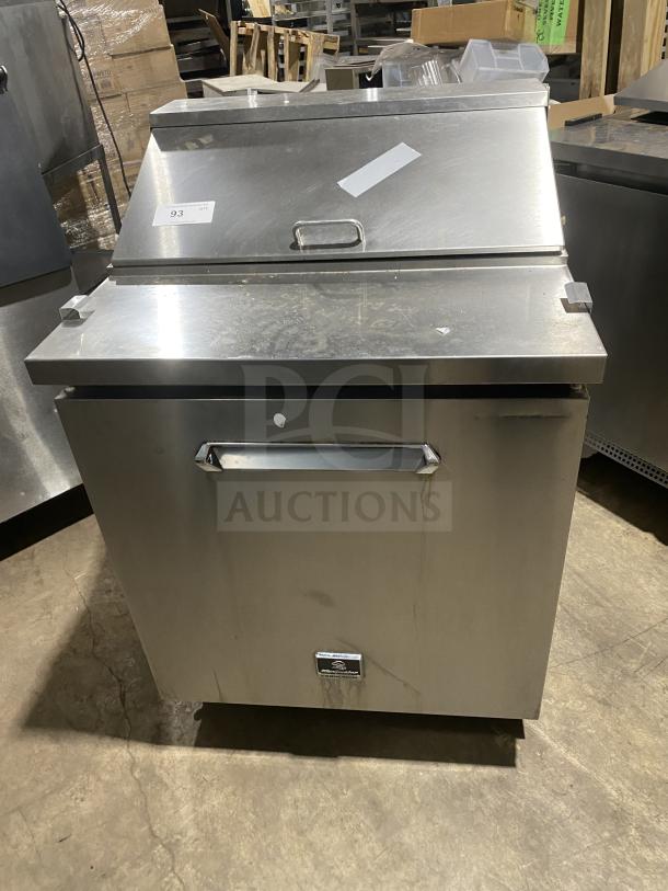 Kelvinator stainless steel refrigerated prep table, model KCHST278, with wired rack, single door, on casters.
