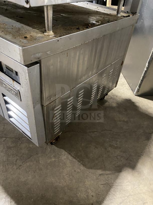 Arctic Air stainless steel 2-drawer refrigerated chef base, model ARCB36Z, 115V, on casters, visible wear.